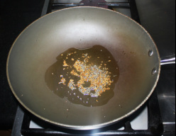 In a pan fry cumin seeds, mustard seeds and asafetida 
